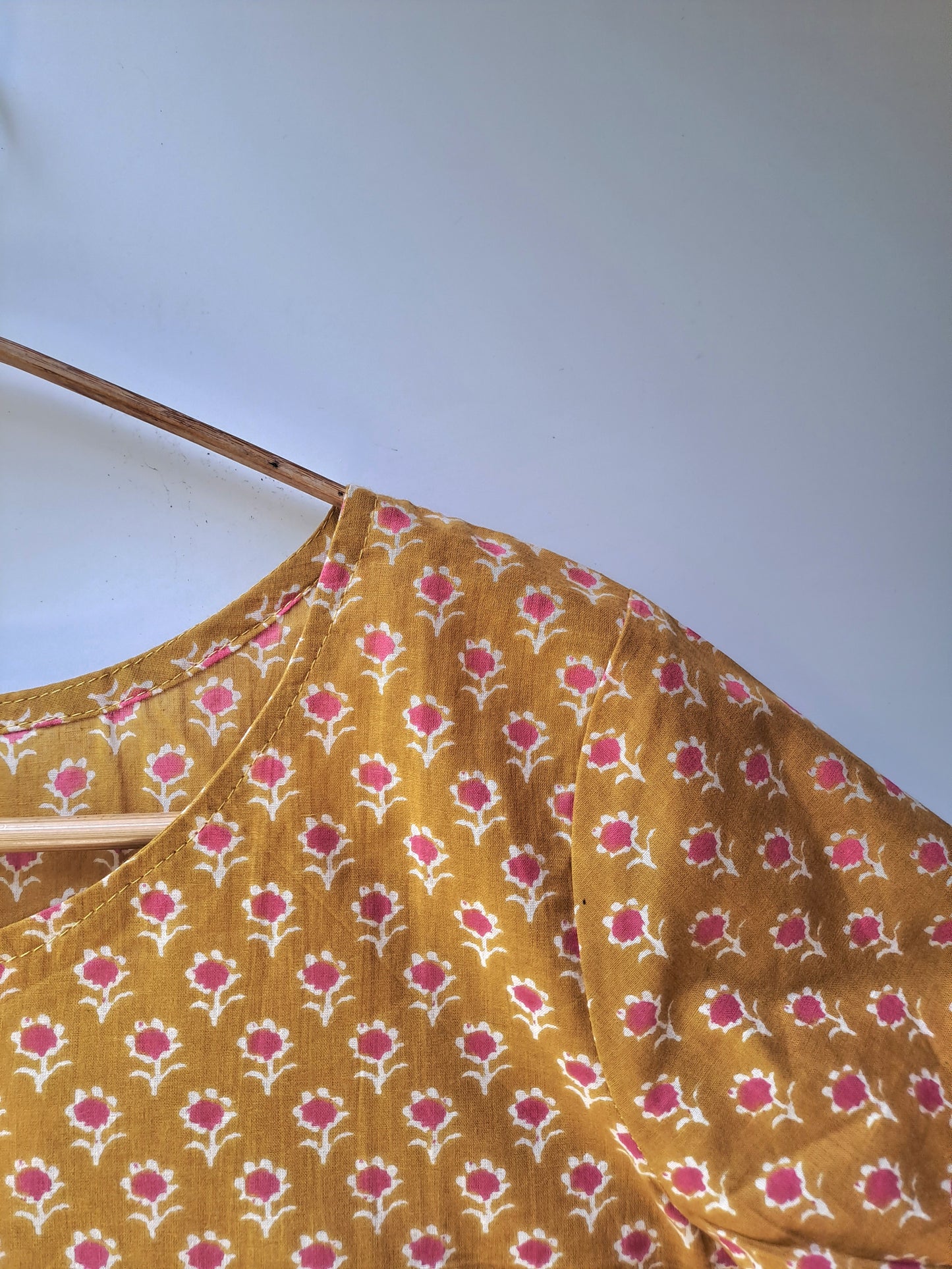 Mustard and Pink Butti Short Kurti