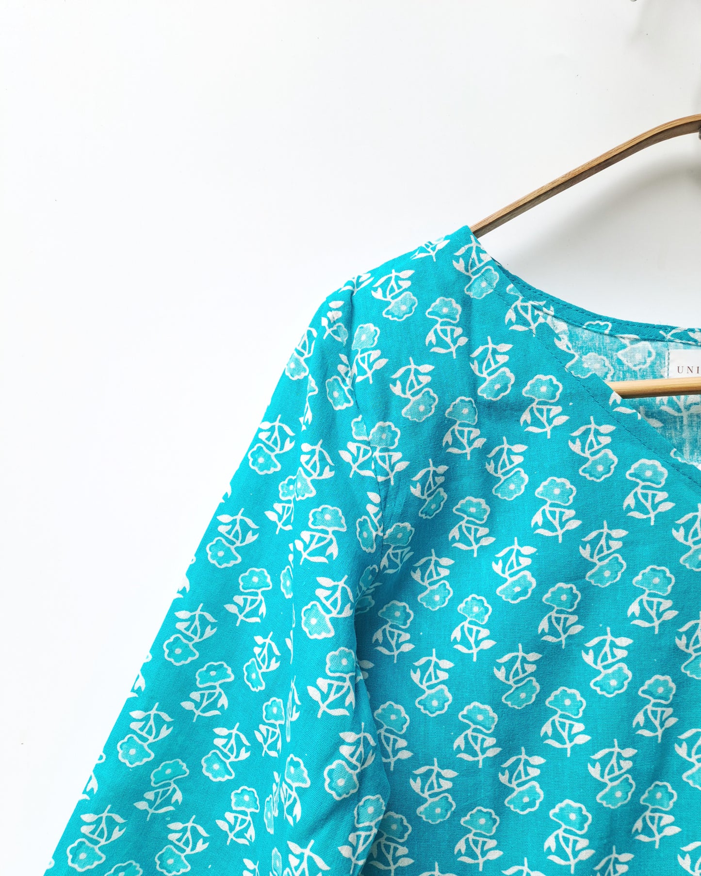 Turquoise Blue Floral Peplum Top